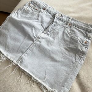 Light Wash MOTHER Denim Mini Skirt with Frayed Hem